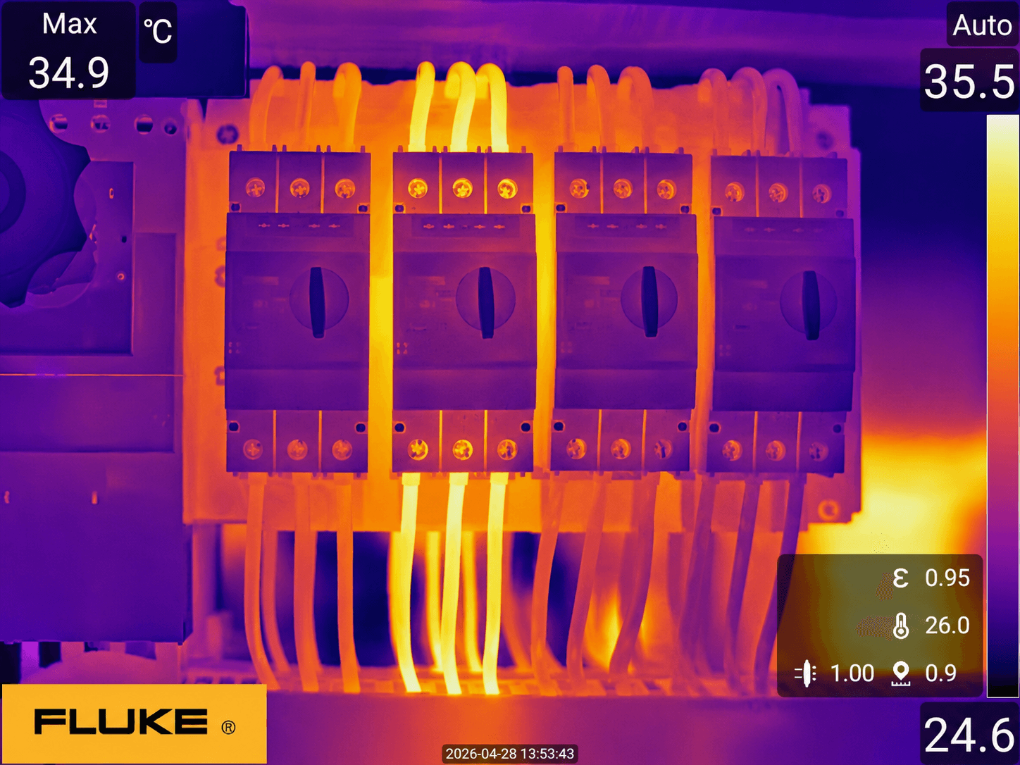 Thermal scan of electrical breakers showing significant heat on one circuit and its wires.